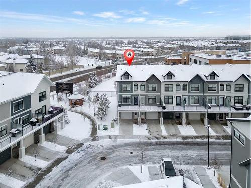 111 Les Jardins Park Se, Calgary, AB - Outdoor With Balcony With Facade