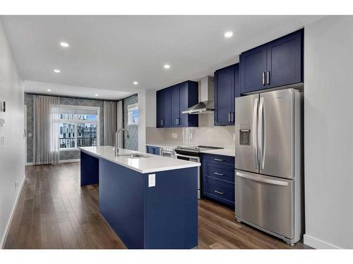 111 Les Jardins Park Se, Calgary, AB - Indoor Photo Showing Kitchen With Stainless Steel Kitchen With Upgraded Kitchen