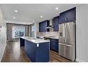 111 Les Jardins Park Se, Calgary, AB  - Indoor Photo Showing Kitchen With Stainless Steel Kitchen With Upgraded Kitchen 