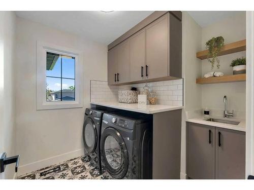 42 Canova Road Sw, Calgary, AB - Indoor Photo Showing Laundry Room