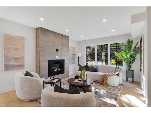 42 Canova Road Sw, Calgary, AB - Indoor Photo Showing Living Room With Fireplace