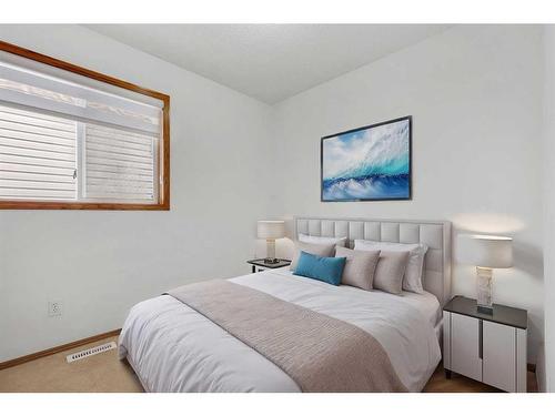 94 Millrise Boulevard Sw, Calgary, AB - Indoor Photo Showing Bedroom