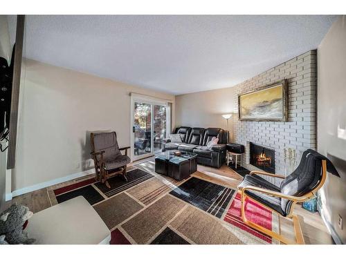 58-287 Southampton Drive Sw, Calgary, AB - Indoor Photo Showing Living Room With Fireplace