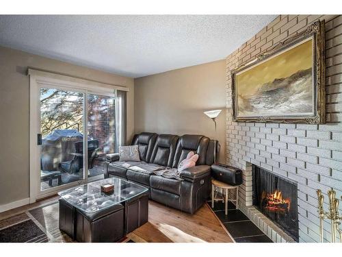 58-287 Southampton Drive Sw, Calgary, AB - Indoor Photo Showing Living Room With Fireplace