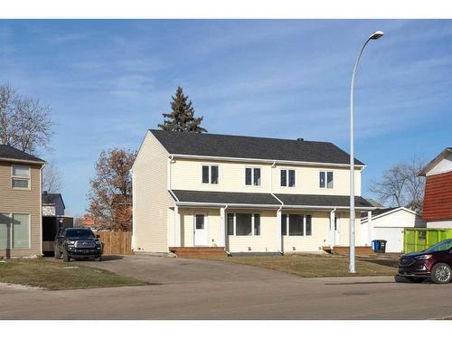 57 Poplar Crescent, Fort Mcmurray, AB - Outdoor With Deck Patio Veranda With Facade