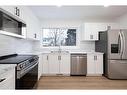 57 Poplar Crescent, Fort Mcmurray, AB  - Indoor Photo Showing Kitchen With Stainless Steel Kitchen With Double Sink 