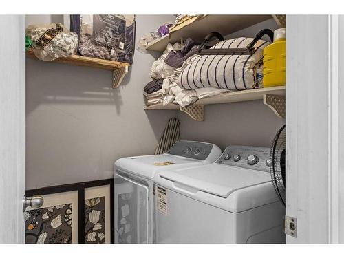 B-133 Park Avenue, Banff, AB - Indoor Photo Showing Laundry Room