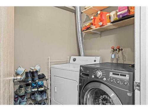 B-133 Park Avenue, Banff, AB - Indoor Photo Showing Laundry Room