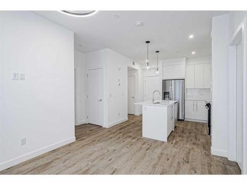 4307-111 Wolf Creek Drive Se, Calgary, AB - Indoor Photo Showing Kitchen