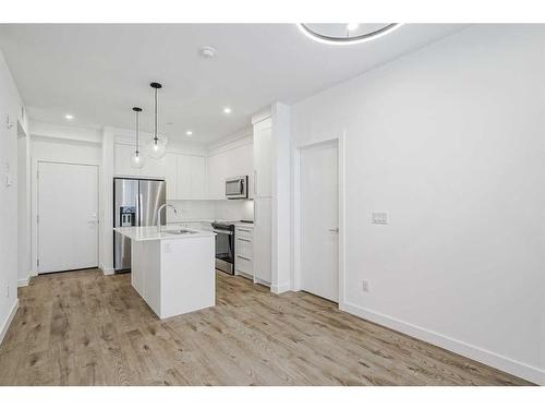 4307-111 Wolf Creek Drive Se, Calgary, AB - Indoor Photo Showing Kitchen