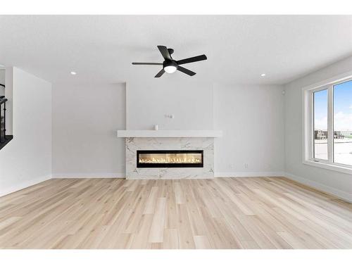 233 Corner Glen Way, Calgary, AB - Indoor Photo Showing Living Room With Fireplace