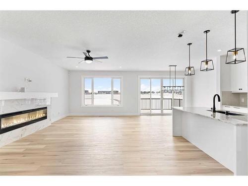 233 Corner Glen Way, Calgary, AB - Indoor With Fireplace