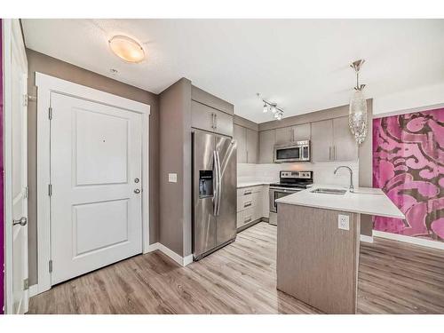 2103-302 Skyview Ranch Drive Ne, Calgary, AB - Indoor Photo Showing Kitchen With Stainless Steel Kitchen