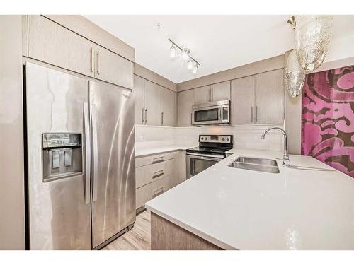 2103-302 Skyview Ranch Drive Ne, Calgary, AB - Indoor Photo Showing Kitchen With Stainless Steel Kitchen With Double Sink With Upgraded Kitchen