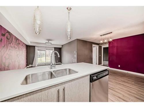 2103-302 Skyview Ranch Drive Ne, Calgary, AB - Indoor Photo Showing Kitchen With Double Sink