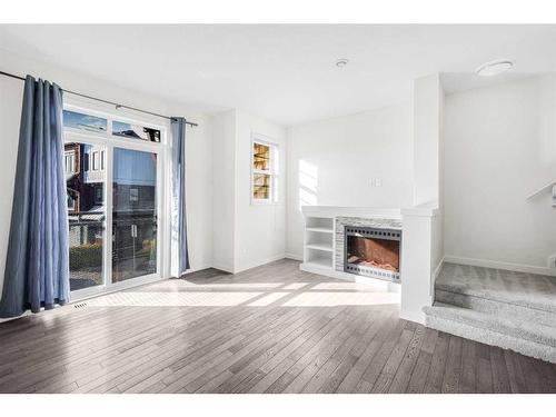 718 Walden Circle Se, Calgary, AB - Indoor With Fireplace