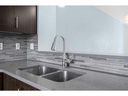 718 Walden Circle Se, Calgary, AB - Indoor Photo Showing Kitchen With Double Sink With Upgraded Kitchen