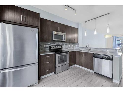 718 Walden Circle Se, Calgary, AB - Indoor Photo Showing Kitchen With Stainless Steel Kitchen With Upgraded Kitchen