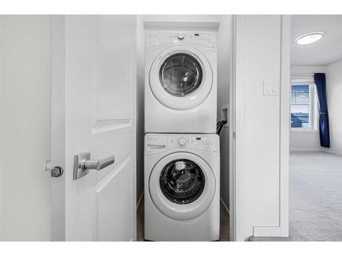 718 Walden Circle Se, Calgary, AB - Indoor Photo Showing Laundry Room