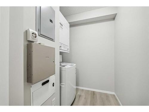 1109-60 Panatella Street Nw, Calgary, AB - Indoor Photo Showing Laundry Room