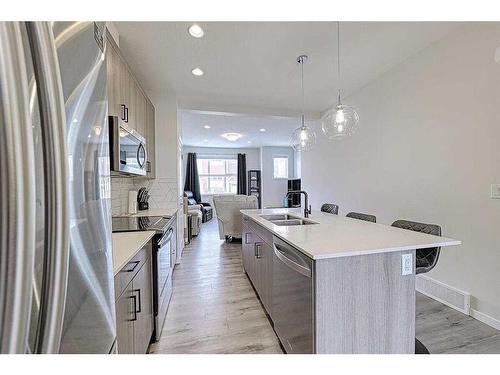 607-355 Nolancrest Heights Nw, Calgary, AB - Indoor Photo Showing Kitchen With Stainless Steel Kitchen With Double Sink With Upgraded Kitchen