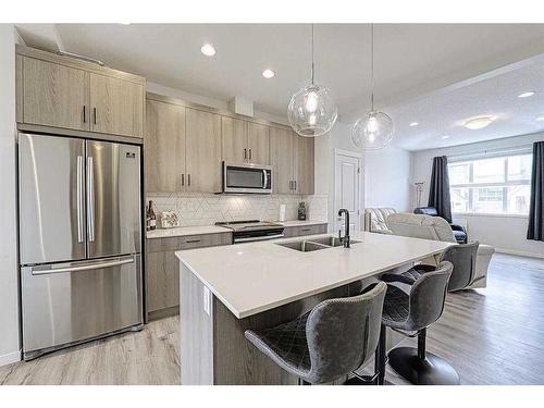 607-355 Nolancrest Heights Nw, Calgary, AB - Indoor Photo Showing Kitchen With Stainless Steel Kitchen With Double Sink With Upgraded Kitchen