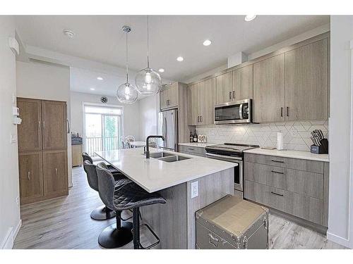 607-355 Nolancrest Heights Nw, Calgary, AB - Indoor Photo Showing Kitchen With Double Sink With Upgraded Kitchen