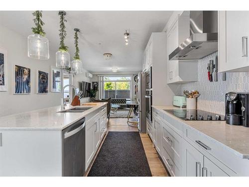 119-30 Walgrove Walk Se, Calgary, AB - Indoor Photo Showing Kitchen With Double Sink With Upgraded Kitchen