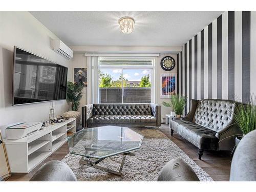 119-30 Walgrove Walk Se, Calgary, AB - Indoor Photo Showing Living Room