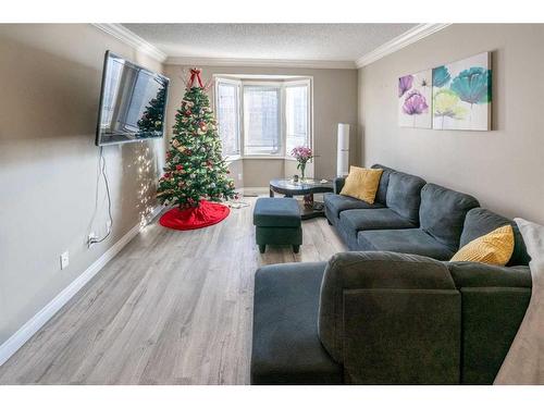 195 Cedarwood Lane Sw, Calgary, AB - Indoor Photo Showing Living Room