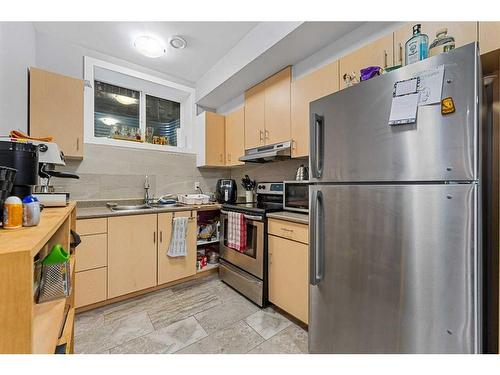 391 Bayview Way Sw, Airdrie, AB - Indoor Photo Showing Kitchen With Stainless Steel Kitchen With Double Sink