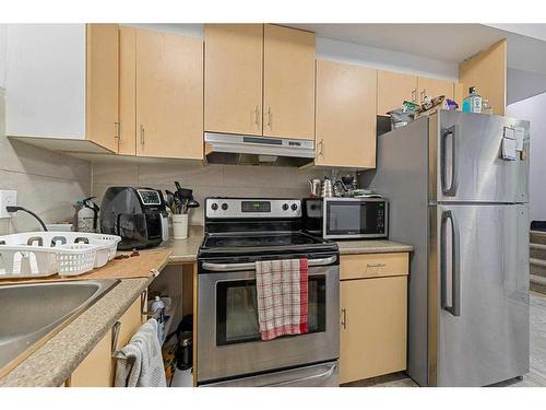 391 Bayview Way Sw, Airdrie, AB - Indoor Photo Showing Kitchen With Stainless Steel Kitchen