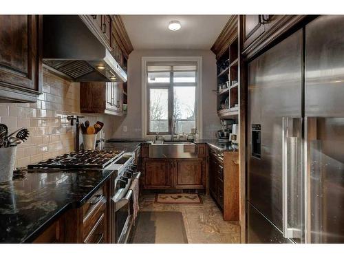 88091 Red Fox Lane West, Rural Foothills County, AB - Indoor Photo Showing Kitchen With Double Sink