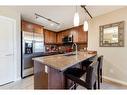 2307-402 Kincora Glen Road Nw, Calgary, AB  - Indoor Photo Showing Kitchen With Double Sink 