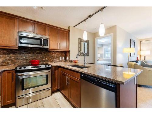 2307-402 Kincora Glen Road Nw, Calgary, AB - Indoor Photo Showing Kitchen With Double Sink