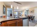 2307-402 Kincora Glen Road Nw, Calgary, AB  - Indoor Photo Showing Kitchen With Double Sink 