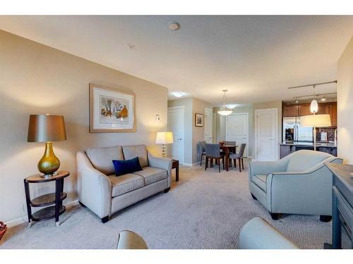 2307-402 Kincora Glen Road Nw, Calgary, AB - Indoor Photo Showing Living Room