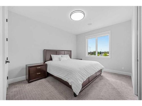 102 Malibou Road Sw, Calgary, AB - Indoor Photo Showing Bedroom