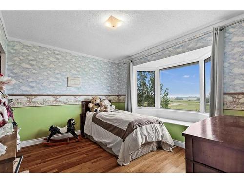 260159 Mountain Ridge Place, Rural Rocky View County, AB - Indoor Photo Showing Bedroom