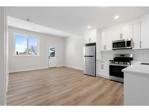 3812 Centre A Street Ne, Calgary, AB - Indoor Photo Showing Kitchen With Stainless Steel Kitchen With Double Sink