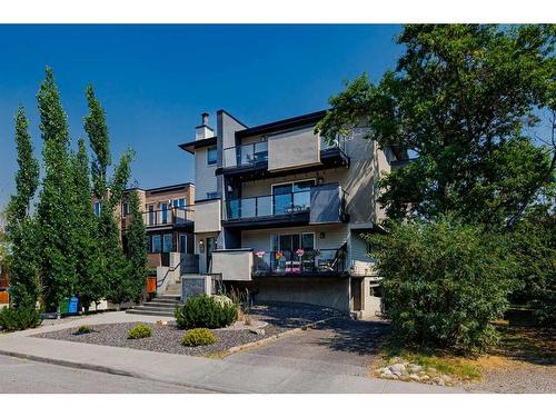 102-1810 16 Street Sw, Calgary, AB - Outdoor With Balcony With Facade