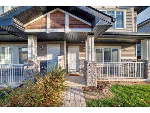 151 Prestwick Villas Se, Calgary, AB - Outdoor With Deck Patio Veranda With Facade