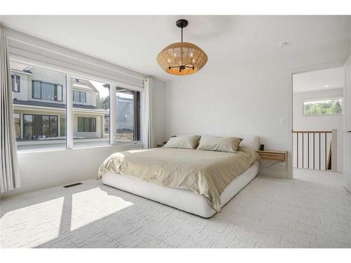 136 Crestridge Terrace Sw, Calgary, AB - Indoor Photo Showing Bedroom