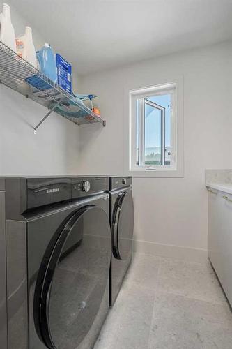 136 Crestridge Terrace Sw, Calgary, AB - Indoor Photo Showing Laundry Room