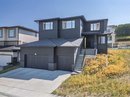 136 Crestridge Terrace Sw, Calgary, AB - Outdoor With Facade