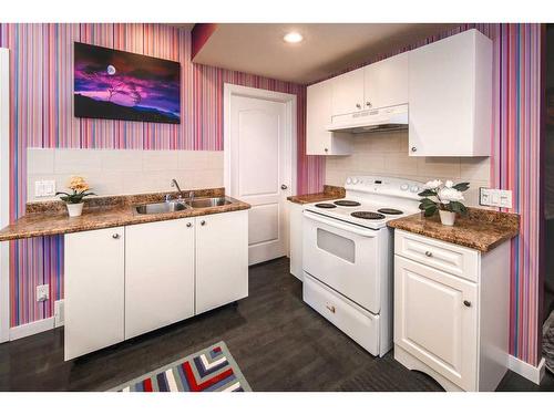 88 Walden Terrace Se, Calgary, AB - Indoor Photo Showing Kitchen With Double Sink