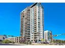 302-325 3 Street Se, Calgary, AB  - Outdoor With Balcony With Facade 