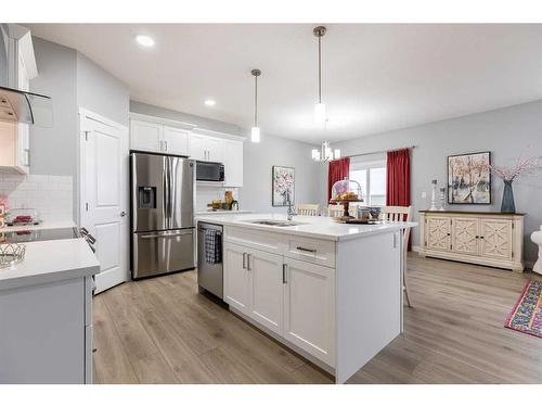 3082 Key Drive Sw, Airdrie, AB - Indoor Photo Showing Kitchen With Upgraded Kitchen