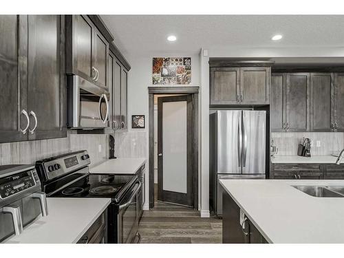 34 Mahogany Close Se, Calgary, AB - Indoor Photo Showing Kitchen With Stainless Steel Kitchen