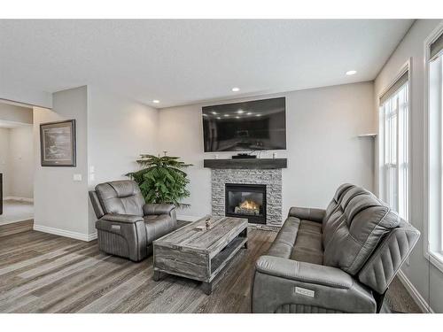 34 Mahogany Close Se, Calgary, AB - Indoor Photo Showing Living Room With Fireplace